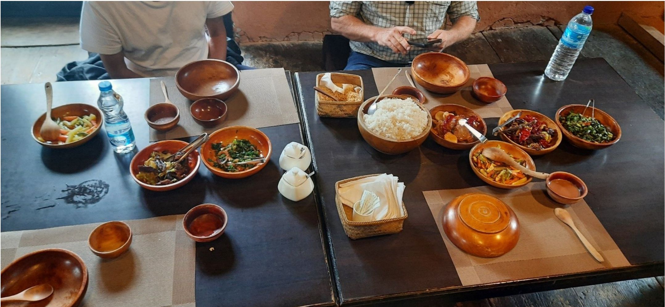 Traditional Bhutanese meal served in wooden bowls